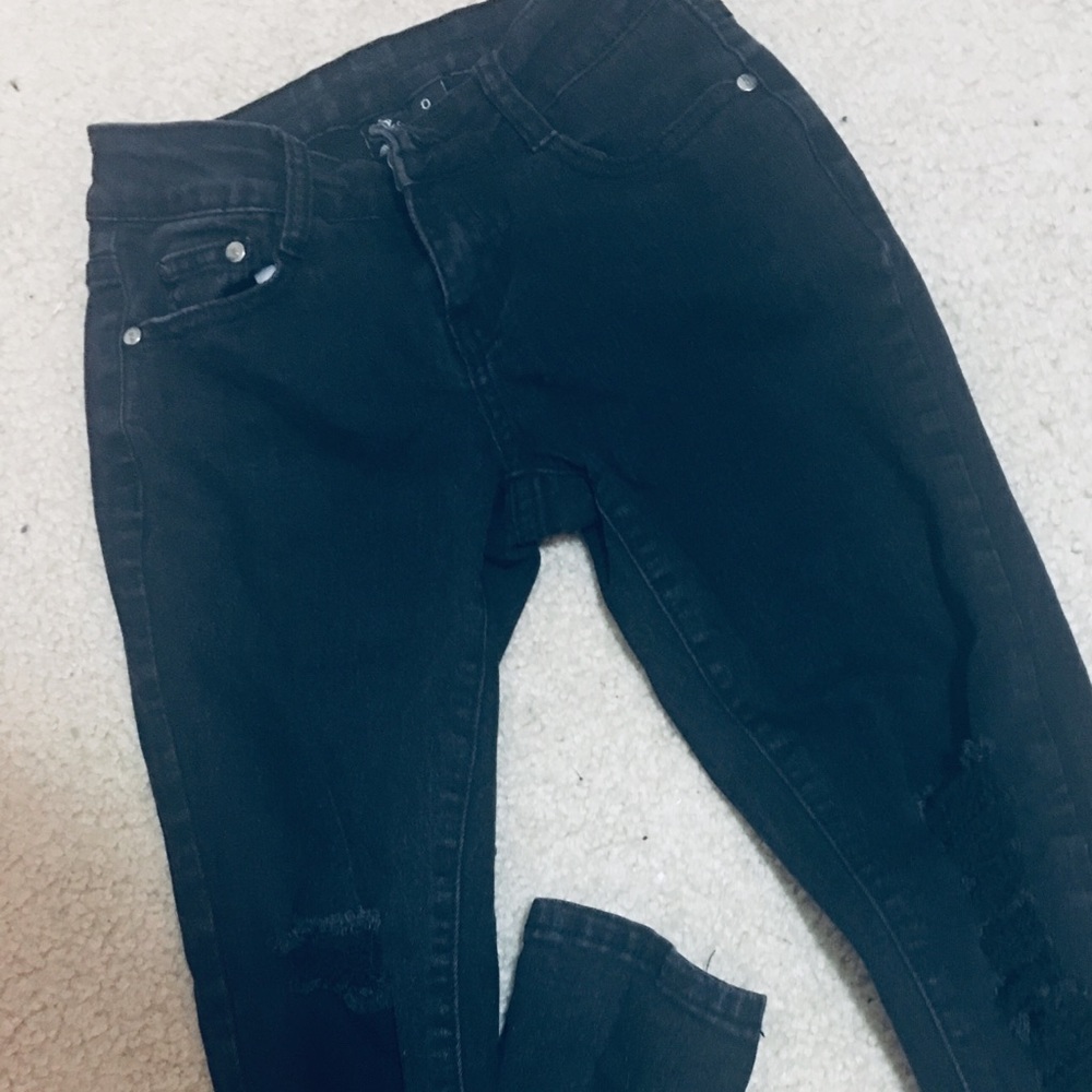 High waisted black ripped jeans